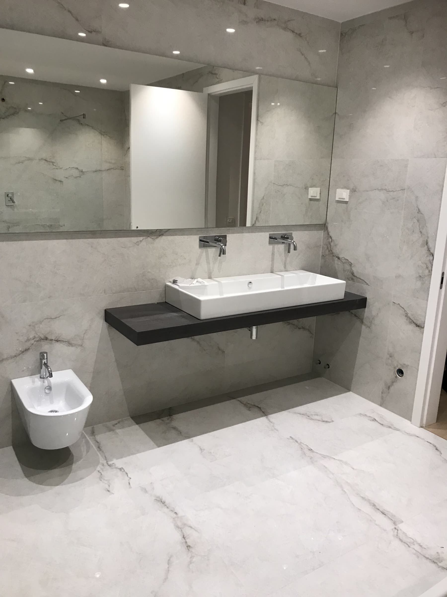 Modern bathroom with marble tiles